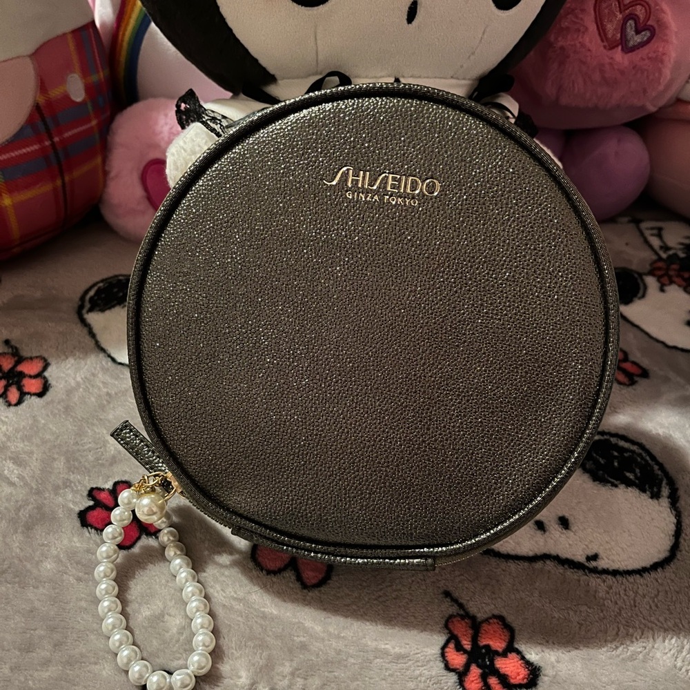 Shiseido Ginza Tokyo Glittery Green pouch